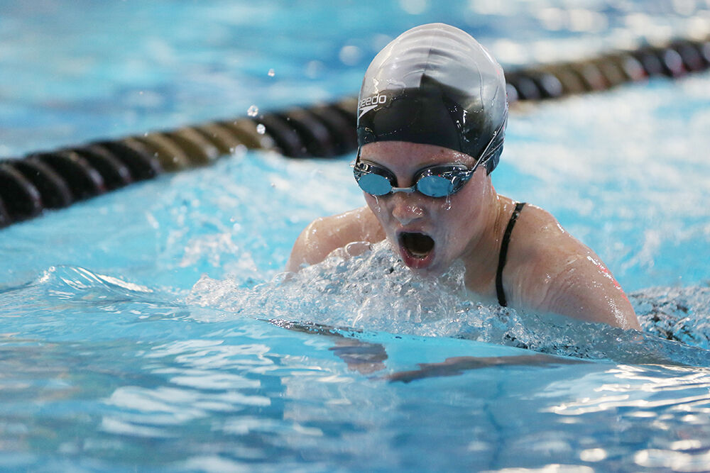 Claire Hicks takes a breath during her breast stroke